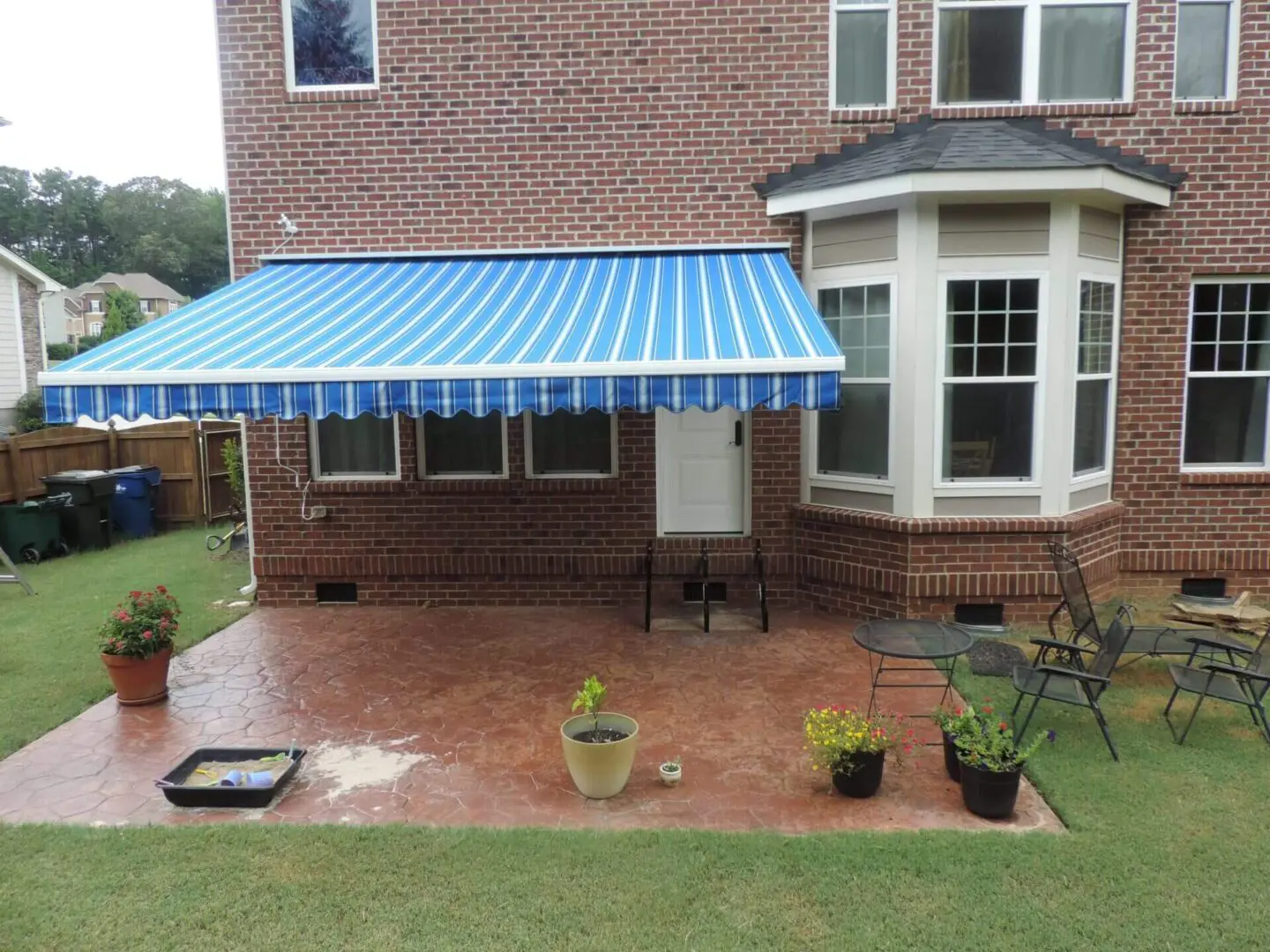 Motorized Retractable awnings in the backyard